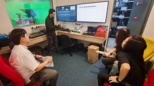 Participants follow the training at the university's control room workstation