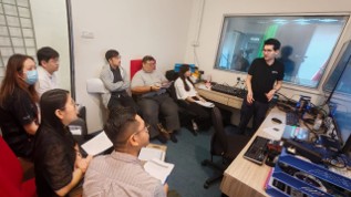 Participants follow the training at the university's control room workstation